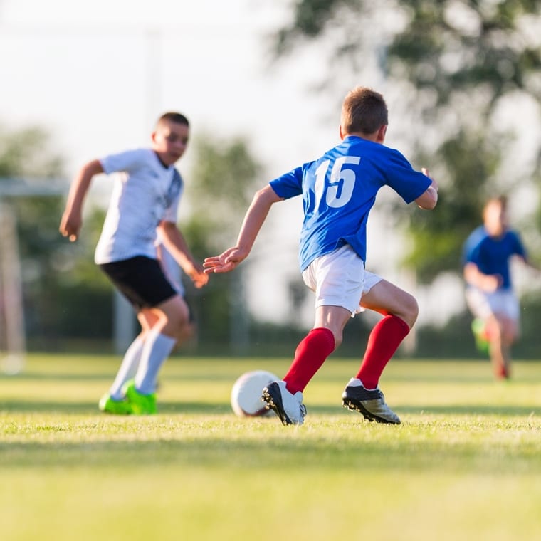 football, Le football sur gazon artificiel